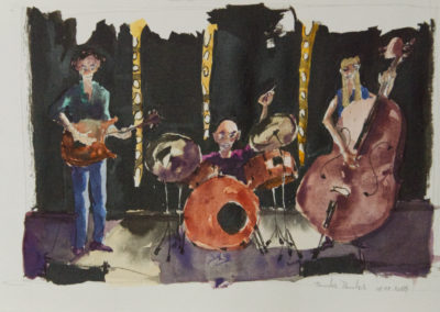 Three jazz musicians. The first musician on the left plays standing guitar, the second plays drums and the third plays double bass.